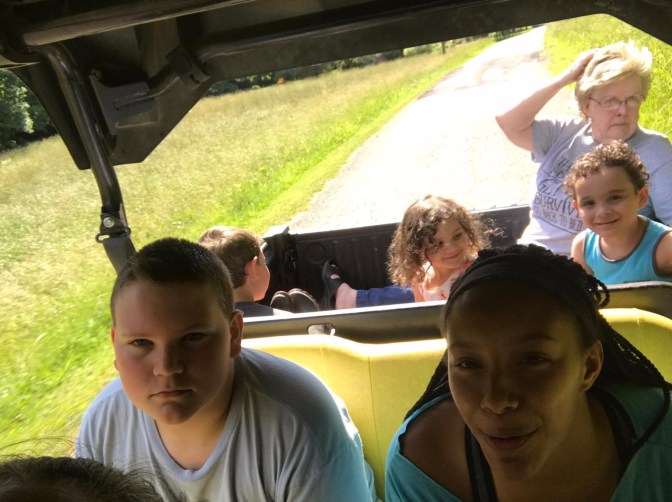 Mom and kids on side by side